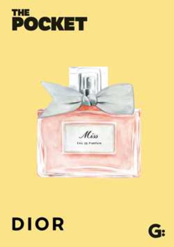 Dior perfume bottle with a bow on a yellow background